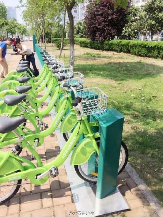 綠色騎行進社區(qū) 低碳出行更環(huán)保 六安市公共自行車走進社區(qū)聽民意